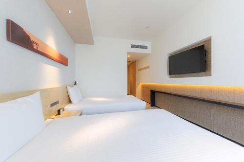 Habitación Doble Superior para no fumadores - 2 camas del hotel Jr Kyushu Blossom Shinjuku. Foto 3