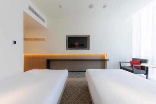 Habitación Doble Superior para no fumadores - 2 camas del hotel Jr Kyushu Blossom Shinjuku. Foto 4