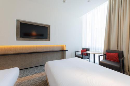 Habitación Doble Superior para no fumadores - 2 camas del hotel Jr Kyushu Blossom Shinjuku. Foto 5