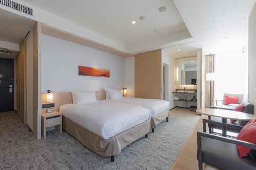 Habitación Doble Deluxe Hollywood - No fumadores - 2 camas del hotel Jr Kyushu Blossom Shinjuku. Foto 6