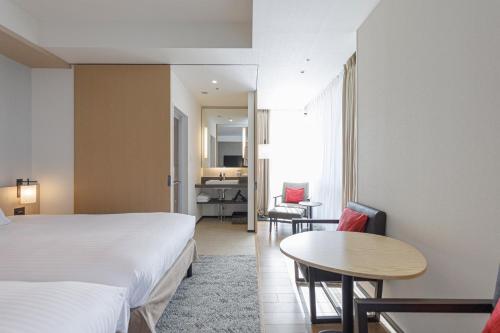Habitación Doble Deluxe Hollywood - No fumadores - 2 camas del hotel Jr Kyushu Blossom Shinjuku. Foto 9