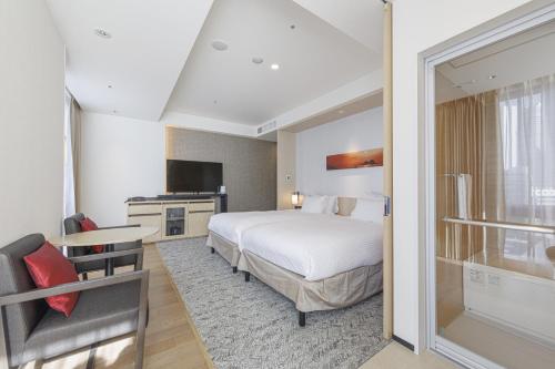 Habitación Doble Deluxe Hollywood - No fumadores - 2 camas del hotel Jr Kyushu Blossom Shinjuku. Foto 12