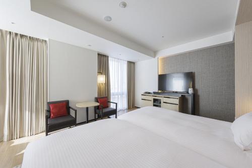 Habitación Doble Deluxe Hollywood - No fumadores - 2 camas del hotel Jr Kyushu Blossom Shinjuku. Foto 14