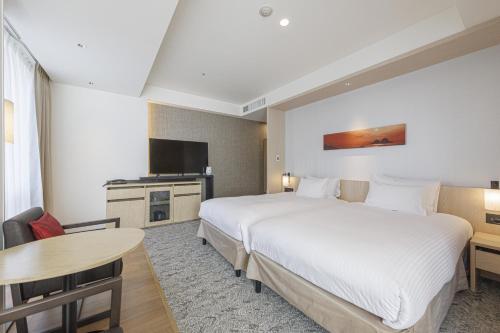 Habitación Doble Deluxe Hollywood (3 personas) - 2 camas - No fumadores del hotel Jr Kyushu Blossom Shinjuku. Foto 8
