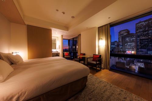 Habitación Doble Deluxe Hollywood (3 personas) - 2 camas - No fumadores del hotel Jr Kyushu Blossom Shinjuku. Foto 11