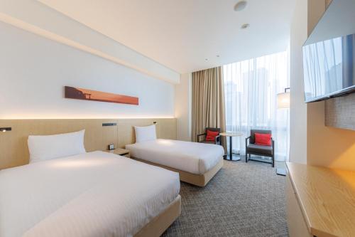 Habitación Doble Deluxe (3 personas) - 2 camas del hotel Jr Kyushu Blossom Shinjuku