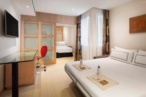 Family room del hotel Melia Sevilla. Foto 1