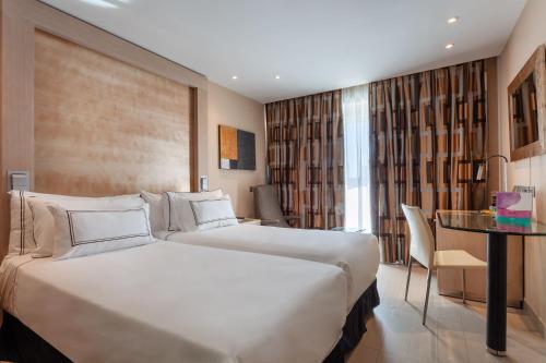 Meliá Twin Bedroom del hotel Melia Sevilla. Foto 3