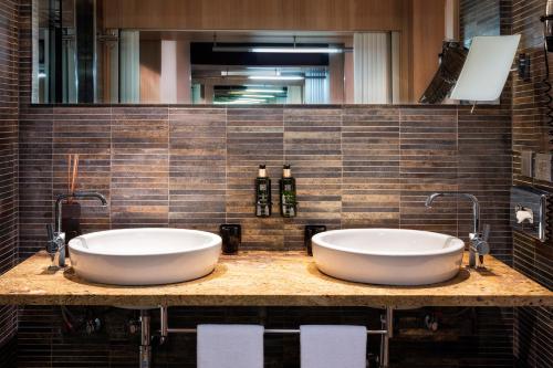 Habitación The Level Melia con terraza del hotel Melia Sevilla. Foto 3