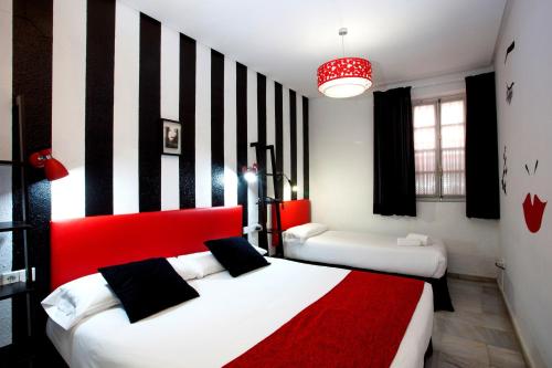 Habitación Triple del hotel Casual De Las Letras Sevilla. Foto 3