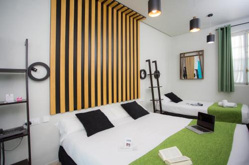 Habitación Triple del hotel Casual De Las Letras Sevilla. Foto 5