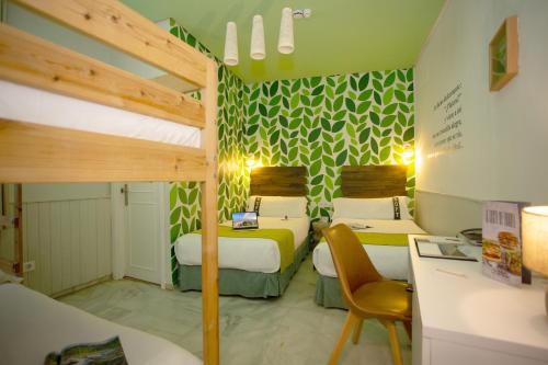 Habitación cuádruple del hotel Casual De Las Letras Sevilla. Foto 14