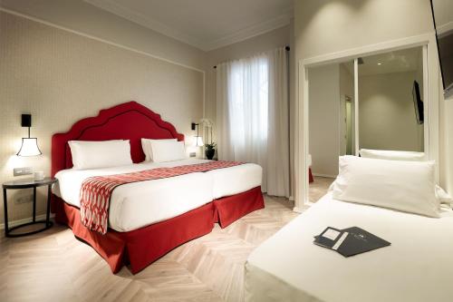 Habitación Triple del hotel Eurostars Regina. Foto 3