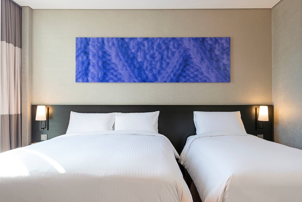 Habitación familiar doble del hotel Central Seven Hotel by Kwon Busan Seomyeon. Foto 3