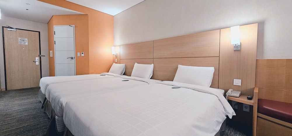 Habitación Triple Estándar del hotel Central Seven Hotel by Kwon Busan Seomyeon