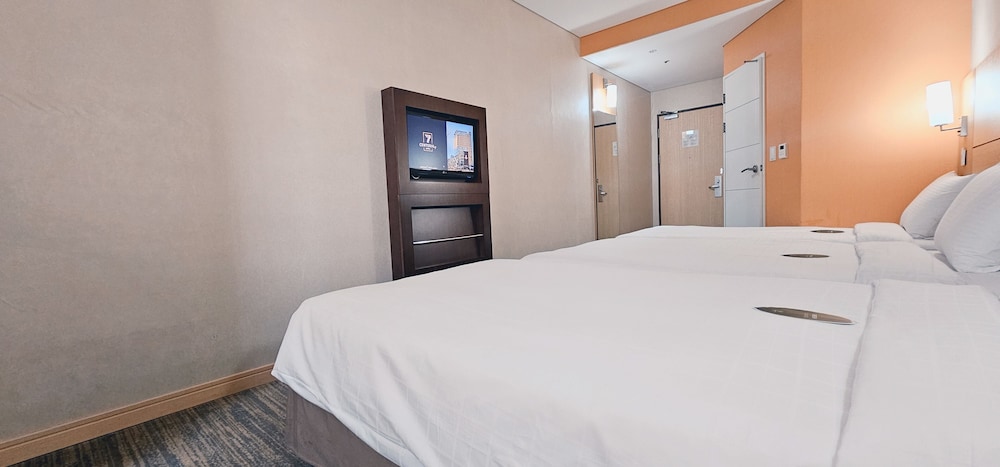 Habitación Triple Estándar del hotel Central Seven Hotel by Kwon Busan Seomyeon. Foto 2