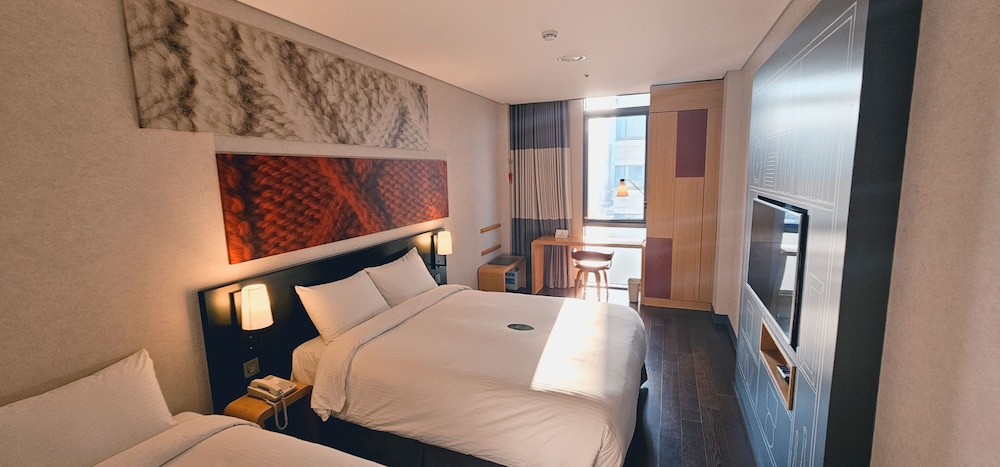 Habitación superior con 2 camas individuales del hotel Central Seven Hotel by Kwon Busan Seomyeon