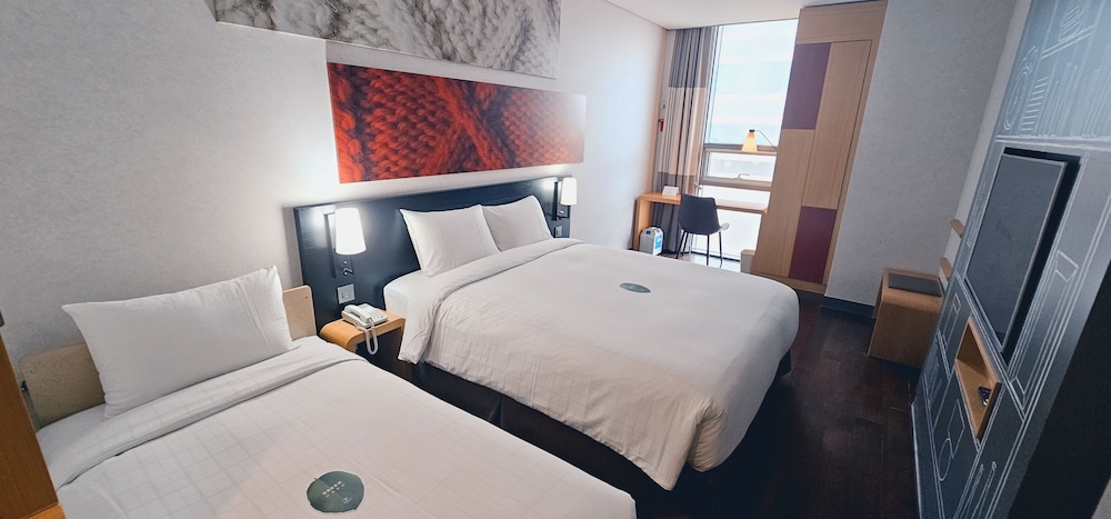 Habitación superior con 2 camas individuales del hotel Central Seven Hotel by Kwon Busan Seomyeon. Foto 2