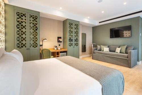 Habitación Doble Deluxe con acceso al spa - 1 o 2 camas del hotel Catalonia Santa Justa. Foto 1