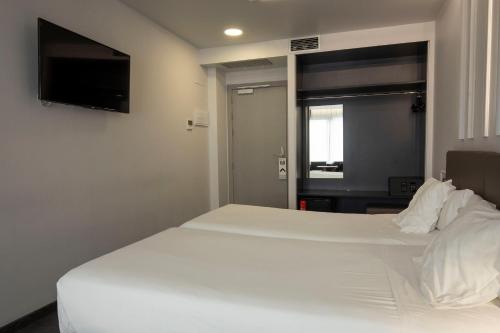 Habitación Doble - 1 o 2 camas del hotel Lux Santiago. Foto 9