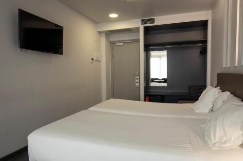 Habitación Doble - 1 o 2 camas del hotel Lux Santiago. Foto 16