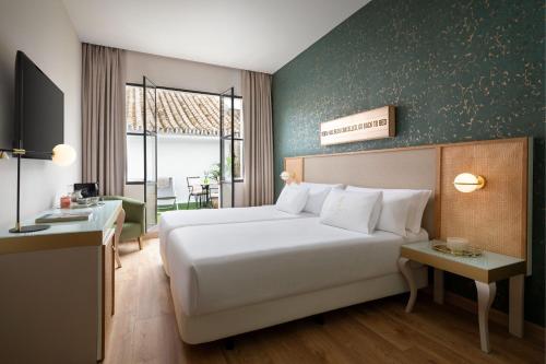 Habitación Legend Terrace con balcón - 1 cama extragrande del hotel Los Seises Sevilla, A Tribute Portfolio. Foto 6