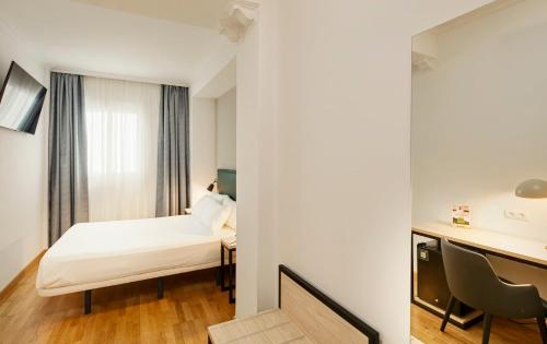 Habitación Doble del hotel Sercotel Las Casas De Los Mercaderes. Foto 2