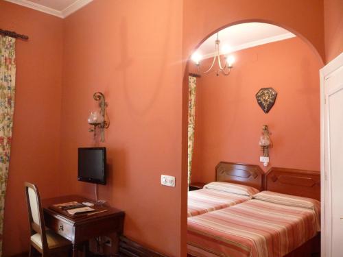 Habitación familiar 3 camas individuales del hotel Abanico. Foto 1