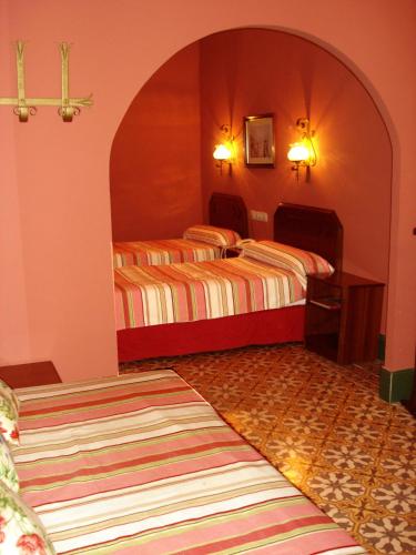 Habitación familiar 3 camas individuales del hotel Abanico. Foto 3
