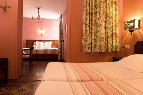 Habitación familiar 3 camas individuales del hotel Abanico. Foto 5