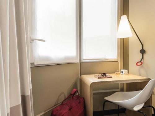 Habitación Doble Estándar - 2 camas del hotel Ibis Paris Gare du Nord Chateau Landon 10ème. Foto 1