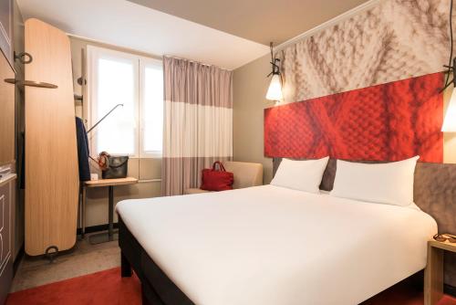 Habitación Estándar - 1 cama doble y 1 individual del hotel Ibis Paris Gare du Nord Chateau Landon 10ème. Foto 7