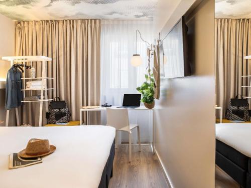 Habitación Doble Estándar del hotel Ibis Maine Montparnasse. Foto 1