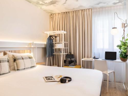 Habitación Doble Estándar del hotel Ibis Maine Montparnasse. Foto 6