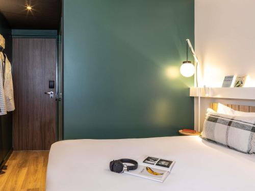 Habitación Individual Estándar del hotel Ibis Maine Montparnasse. Foto 1