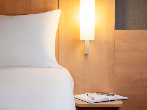 Habitación Individual Estándar del hotel Ibis Maine Montparnasse. Foto 4