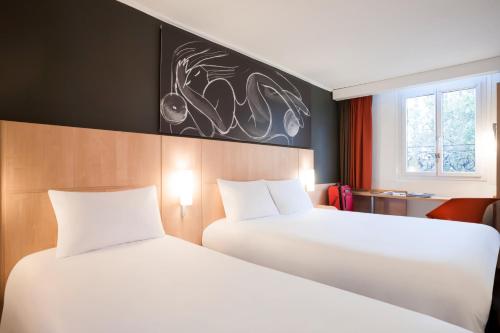 Habitación Estándar - 1 cama doble y 1 individual del hotel Ibis Maine Montparnasse. Foto 5
