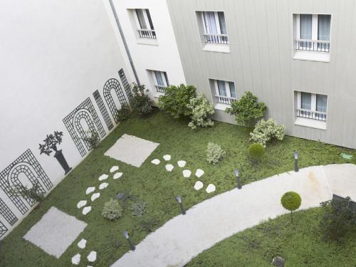 Habitación Superior - 1 cama doble y 1 cama individual del hotel Kyriad Paris 18 - Porte de Clignancourt