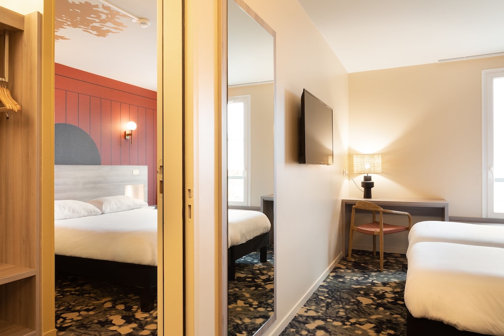 Habitación estándar con 2 camas individuales del hotel ibis Styles Versailles Saint Quentin en Yvelines. Foto 1