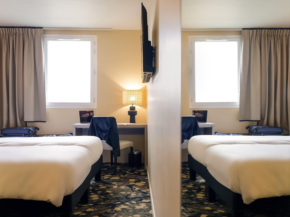 Habitación estándar con 2 camas individuales del hotel ibis Styles Versailles Saint Quentin en Yvelines. Foto 6