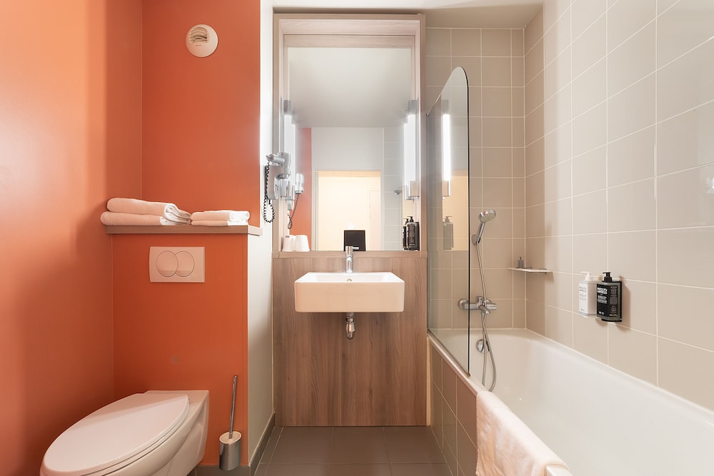 Habitación estándar con 2 camas individuales del hotel ibis Styles Versailles Saint Quentin en Yvelines. Foto 10