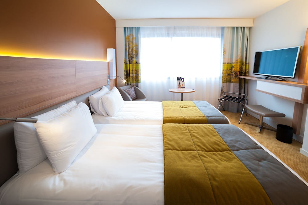 Habitación Classic con dos camas individuales del hotel Mercure Macon Bord De Saône. Foto 4