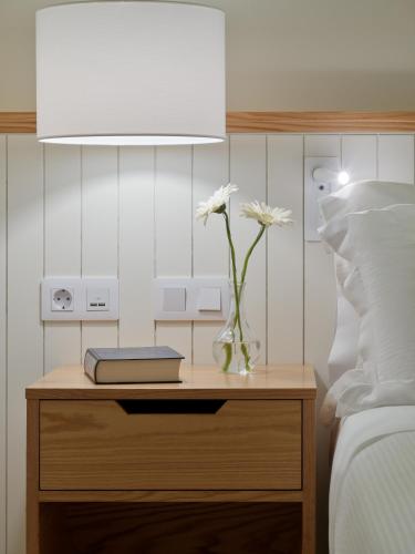 Habitación doble Lujo Vista Piscina Balcón o Terraza 1 Cama Individual 1 Cama super king del hotel H10 Gran Tinerfe. Foto 3