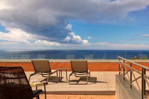 Suite Junior The Level con vistas al mar y terraza solárium del hotel Melia Jardines Del Teide - Adults Only