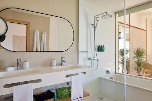 Suite Junior The Level con vistas al mar y terraza solárium del hotel Melia Jardines Del Teide - Adults Only. Foto 6