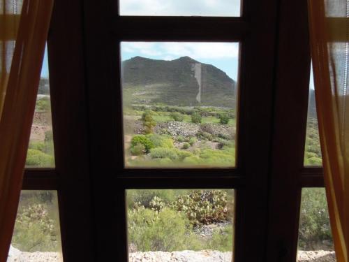 Habitación Triple con baño compartido del hotel El Cerro de la Luna. Foto 1