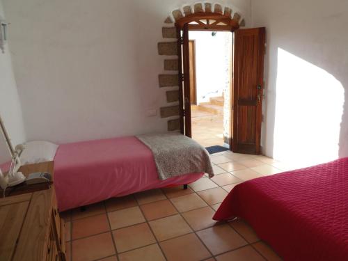 Habitación Triple con baño compartido del hotel El Cerro de la Luna. Foto 9