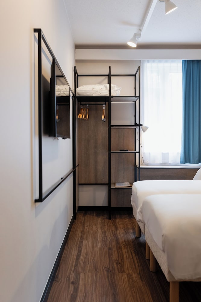 Habitación Standard con 2 camas individual del hotel Ibis Namur Centre. Foto 4