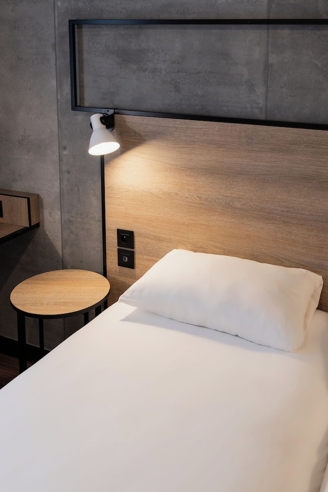 Habitación Standard con 2 camas individual del hotel Ibis Namur Centre. Foto 5