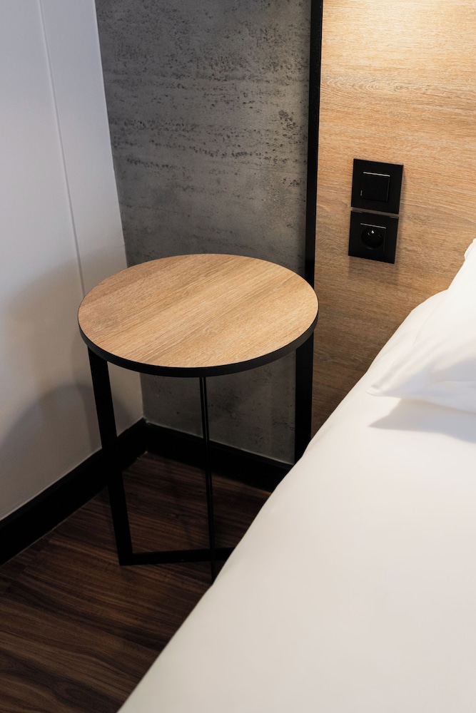 Habitación Standard con 2 camas individual del hotel Ibis Namur Centre. Foto 8
